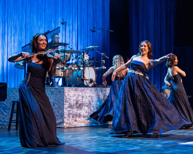 Celtic Woman performing on tour
